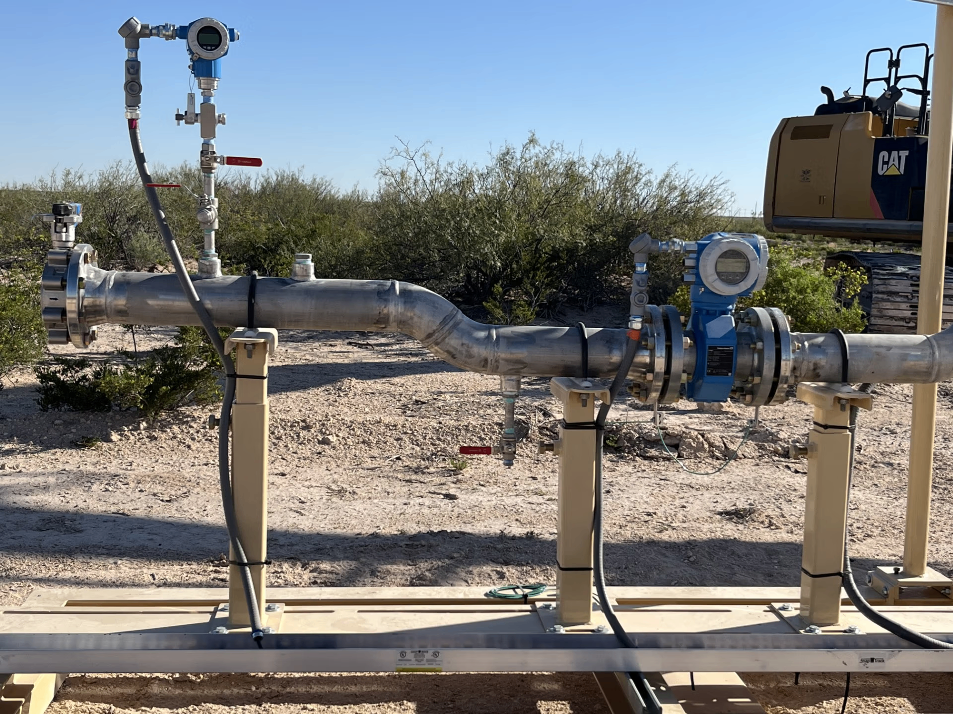 Stainless steel measurement skid with flow meters installed in the field